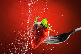 bigstock-Strawberry-On-A-Fork-Punctured-73746679