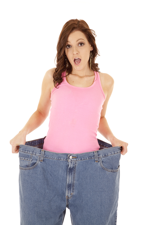 bigstock-Pink-Top-Big-Pants-Surprised-F-22076741