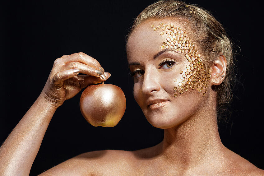 bigstock-girl-with-golden-bodyart-posin-78400982