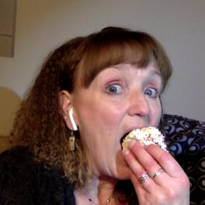 Glenna Lechner, Proofreader, eating a delicious cupcake